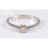 A 9ct gold diamond solitaire ring, the illusion set princess cut diamond weighing approx 0.1