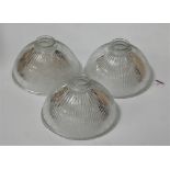 A set of three early 20th century glass light shades, each of fluted domed form, dia. 21.5cm (3)