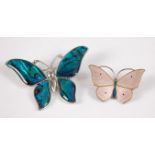 A continental silver gilt and enamel set butterfly brooch; together with a paste example (2)