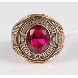 An American 10ct gold and synthetic ruby set commemorative signet ring, for North Hills High School,