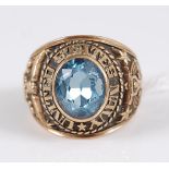 An American 10ct gold and synthetic blue topaz set commemorative signet ring, for the United