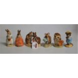 A collection of 6 Royal Albert Beatrix Potter figures to include The Christmas Stocking, Poorly