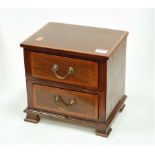 An Edwardian mahogany and satinwood banded two drawer table top chest (formerly part of a dressing