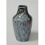 A Cobridge stoneware vase of baluster form decorated in the Pussy Willow pattern on a mottled blue