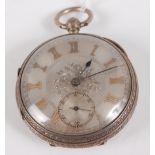 A late Victorian Gents silver cased open faced gent's pocket watch, having an engine turned silvered