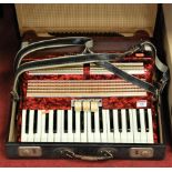 An early 20th century World Master piano accordion, cased