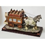 A Juliana Collection painted resin figure of a stage coach raised on rectangular plinth base, height