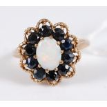 A 9ct gold, opal and sapphire set flower head dress ring, 3.5g, size M