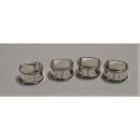 A set of four modern silver napkin rings by Mappin & Webb