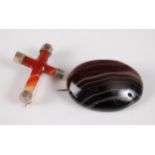 A carnelian cross brooch, with silver capped ends, 38mm long, together with an oval banded agate