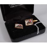 A pair of gilt metal and crystal gent's cufflinks