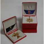 A collection of 5 boxed Georg Jensen Christmas tree ornaments, years to include 1989, 1993, 1994,