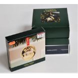 Three boxed Georg Jensen Christmas tree decorations years include 2002, 2003, 2006, together with