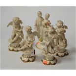 A set of four late 19th century Capo di Monte bisque figures depicting the Four Seasons, each in