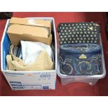 Two boxes of assorted lady's handbags, luggage and accesories