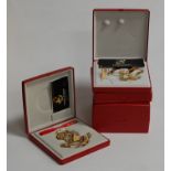 A collection of four boxed Georg Jensen Christmas tree ornaments years include 1991, 1992, 1985,