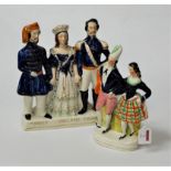 A Victorian Staffordshire Crimean war commemorative figure group depicting Queen Victoria flanked by