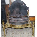 A steel and brass Adam style serpentine front fire basket, having integral back plate, w.65.5cm