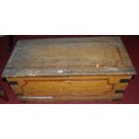 A 19th century scrumble finish pine and iron bound hinge topped tool chest, having end carry