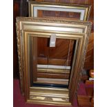 Nine various large and medium sized picture frames, including some gilt examples