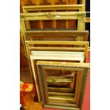 Twelve various large and medium size picture frames, to include gilt examples