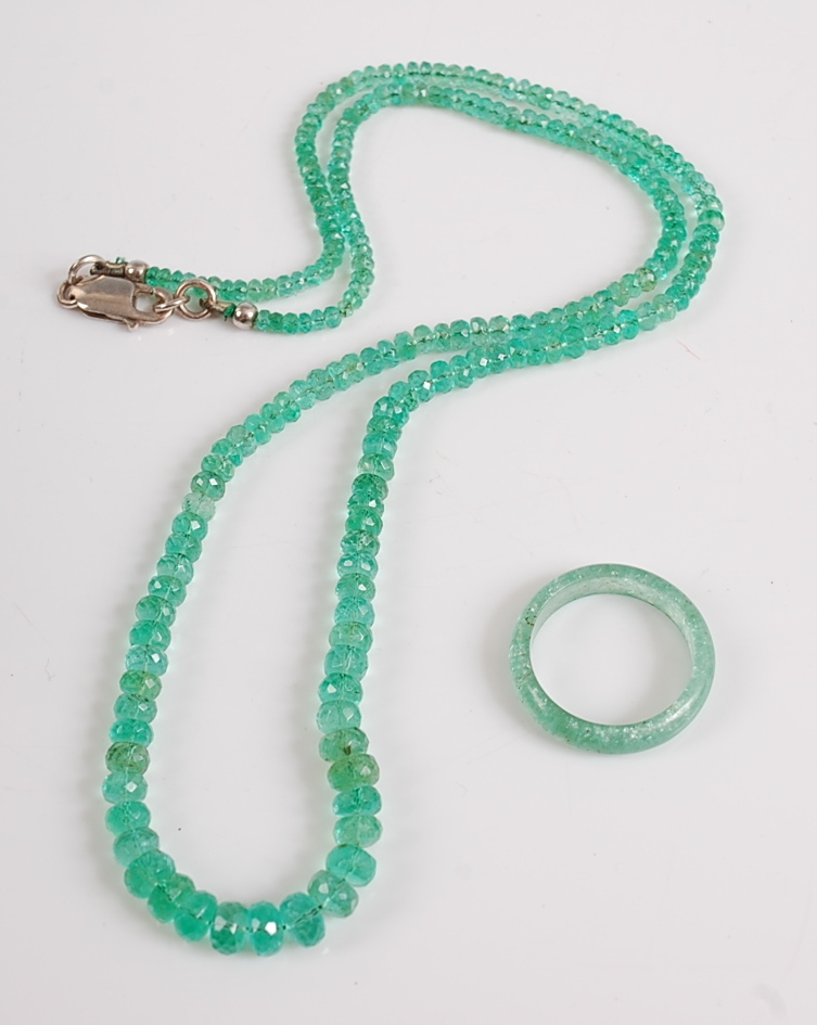 An emerald necklace, the 210 graduated faceted beads diameters measuring between 2.7 and 5.7mm, with