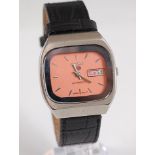 A gent's steel cased Seiko automatic wristwatch, circa 1970s, having a signed pink dial with baton