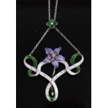 A circa 1900 yellow metal and enamelled openwork pendant in Suffragette colours, set with a centre
