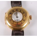 A George V gent's 18ct gold cased half hunter wristwatch, the hinged cover set with Arabic