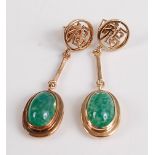 A pair of yellow metal and jadeite drop earrings, each with two oval dyed jadeite cabochons,