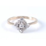 An 18ct yellow gold marquise shaped diamond cluster ring, the nine graduated single cut diamonds