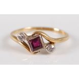 An Art Deco 18ct gold and platinum, ruby and diamond set ring, arranged as a centre rubover set