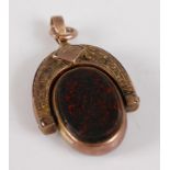 A Victorian 9ct gold and bloodstone set swivel fob pendant, having engraved decoration, gross weight