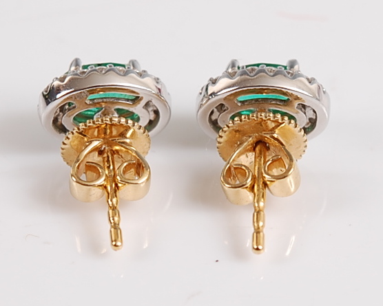 A pair of 18ct yellow and white gold oval emerald and diamond cluster earrings, in claw settings, - Image 3 of 3