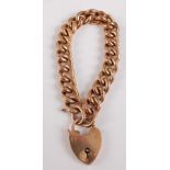 A 9ct gold hollow curblink bracelet, with heart shaped padlock clasp and safety chain, 22.2g, 18cm