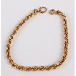 A yellow metal twisted rope link bracelet, with bolt ring clasp, length 215mm, w.4.2mm, gross weight