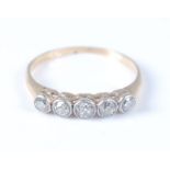 A yellow and white metal five stone diamond half hoop eternity ring, the five graduated old European