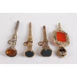 An assortment of fob seals, to include one rectangular carnelian, 12.5 x 9.8mm, in engraved floral