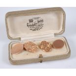 A pair of 9ct rose gold oval double-ended cufflinks, each with one plain and one floral engraved