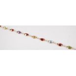 A contemporary 14ct gold multi-stone set bracelet, to include amethyst, garnet, green and blue