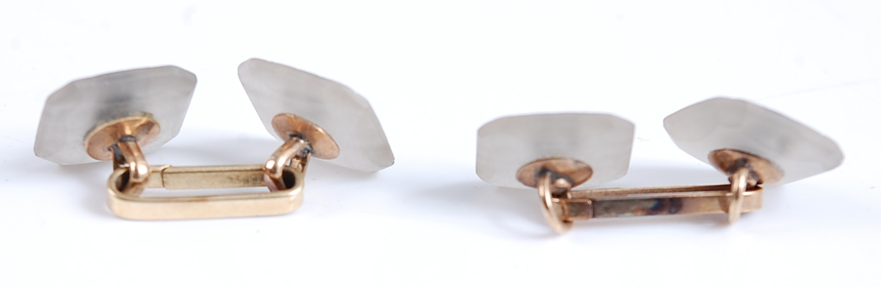 A pair of double ended cuff links , each with two octagonal carved chalcedony plates with black - Image 2 of 2