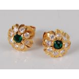 A pair of 22ct gold, green stone and colourless sapphire circular cluster earrings, the round