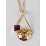 An 18ct yellow gold abstract pendant, featuring a square cut amethyst surmounting a disc set with