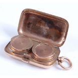 A late Victorian 9 carat gold double sovereign case, of rounded rectangular form, engraved with