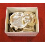 A box of miscellaneous silver plated wares, to include a pair of chamber sticks, various coasters,