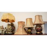 A pair of modern ceramic table lamps each of baluster form decorated with bamboo in the Chinese