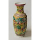 A Chinese Republic yellow ground floor vase, of baluster form, decorated with various figures on