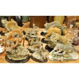 A large collection of modern resin animal figures to include Country Artists Wolf Running in Snow,