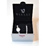 A ladies Viale steel cased and paste set wristwatch having an oval mother of pearl dial with