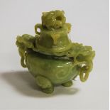 A reproduction Chinese carved jade style koro and cover, the cover surmounted by a dragon, having